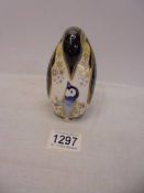 A Royal Crown Derby penguin paperweight with stopper.