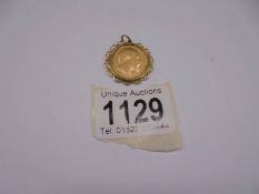 An Edward VII full sovereign mounted in a 9ct gold pendant, gross weight 9.64 grams.