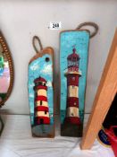 2 paintings of lighthouses on reclaimed wood by Sally Anderson