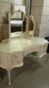 A kidney shaped triple mirror dressing table, COLLECT ONLY.