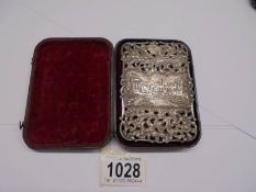A cased Nathaniel Mills silver card case featuring Windsor Castle and Abbotsford House, Bham 1844,