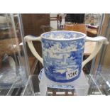 A large Wade blue and white twin handled cider tankard.