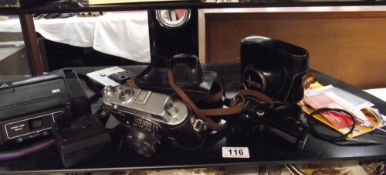 a vintage zorki-4 petri camera, kodamatic 950, + kodak disk 4000 cameras