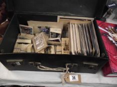 An old case of postcards and photographic cigarette cards by Churchman, Senior Service, Beatall