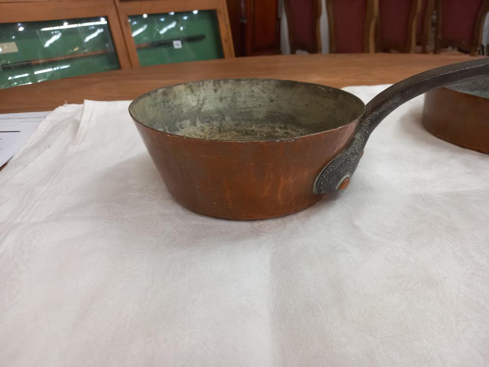 Three Victorian copper pans. - Image 4 of 11