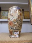 A hand painted Japaneses vase, 30 cm tall.