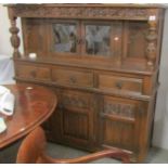 A carved oak cabinet, COLLECT ONLY.