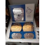 A boxed vintage set of Cavalier silver plated coaster place mats