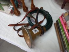A vintage 'Furst-Pless' German horn with green leather strap