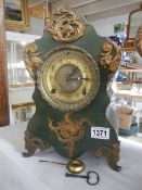 An early French iron mantel clock. IN WORKING ORDER.
