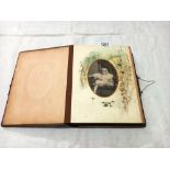 A Victorian photo album with mainly portraits