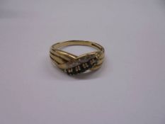 A sapphire and diamond gold ring, size N, 1.7 grams.