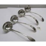 Four large silver plate soup ladles.