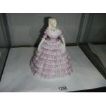 A Coalport Ladies of Fashion figurine.