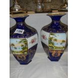 A pair of oriental vases. COLLECT ONLY.