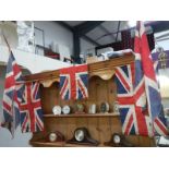 A quantity of vintage flags on poles etc.,