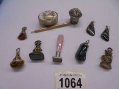 A mixed lot including seals, fobs, pendant, earrings etc.,