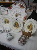 A Royal Albert Old Country Roses clock, 3 thatched cottage plates, Beswick Donkey etc.,