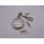 A silver pocket watch, John Jenkinson 40425 on silver Albert chain with key, in working order.