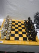 A chess set with board,