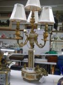 A French ormolu and alabaster four lamp table light,