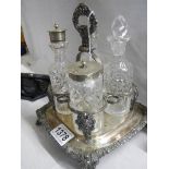 An early Victorian silver plate and glass condiment set.