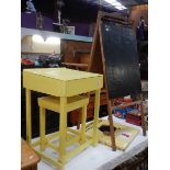 A vintage painted wooden child's school desk with stool. blackboard with integral abacus
