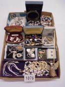A good mixed lot of costume jewellery.