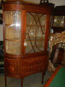 A superb quality Edwardian mahogany inlaid display cabinet with concave glass sides, COLLECT ONLY.