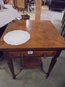 A mahogany 'Envelope' card table, COLLECT ONLY.