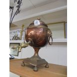 A copper samovar urn.