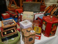 A large box of vintage tins.