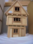A small Elizabethan style dolls house, COLLECT ONLY.