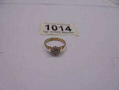 A 9ct gold floral diamond ring, size L, 1.9 grams.