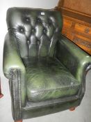 A green leather button back chair, COLLECT ONLY.