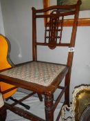 An Edwardian mahogany inlaid bedroom chair, COLLECT ONLY.