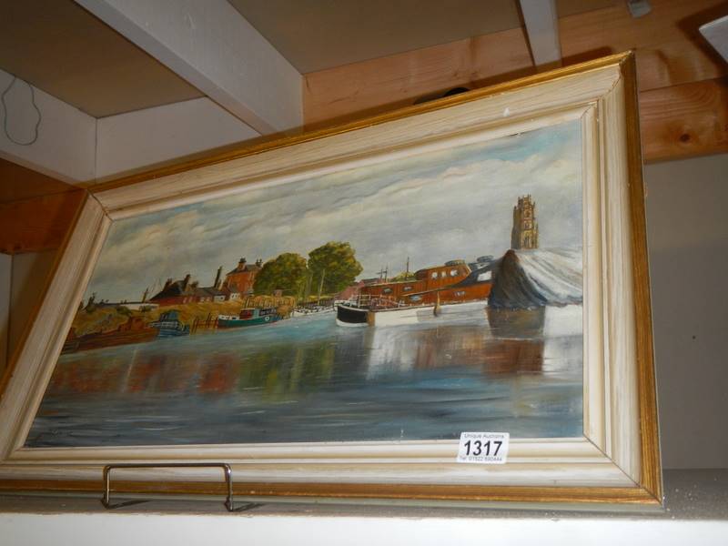 An oil on canvas river scene signed M L Woodcock.