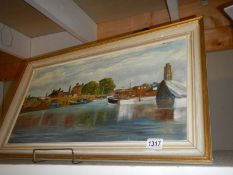 An oil on canvas river scene signed M L Woodcock.