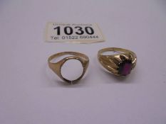 A 9ct gold ring set red stone size S 3.75 grams and a 9ct gold ring missing stone, 1.5 grams.