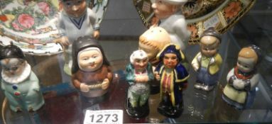 A good selection of novelty salt and pepper pots (mid 20th century).