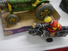 A Mettoy tin plate tractor a/f and a West German tin plate motorcycle.