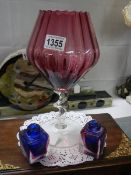 A cranberry and clear glass goblet and other glass ware, COLLECT ONLY.