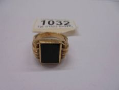 A 9ct gold gent's ring set onyx, size Y, 14.6 grams.