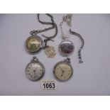 Four vintage pocket watches.