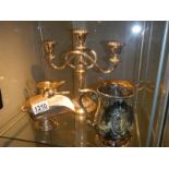 A silver plate tankard, candelabra and sugar scuttle.