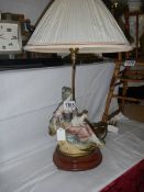 A figural table lamp with shade, COLLECT ONLY.