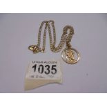 A 9ct gold St. Christopher with attached 9ct gold chain, 11 grams.