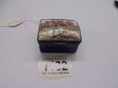 An early 20th century enamel snuff box featuring a wrestling match.