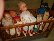 A vintage doll's cot & a quantity of vintage dolls including celluloid, costume, black etc., COLLECT