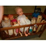 A vintage doll's cot & a quantity of vintage dolls including celluloid, costume, black etc., COLLECT